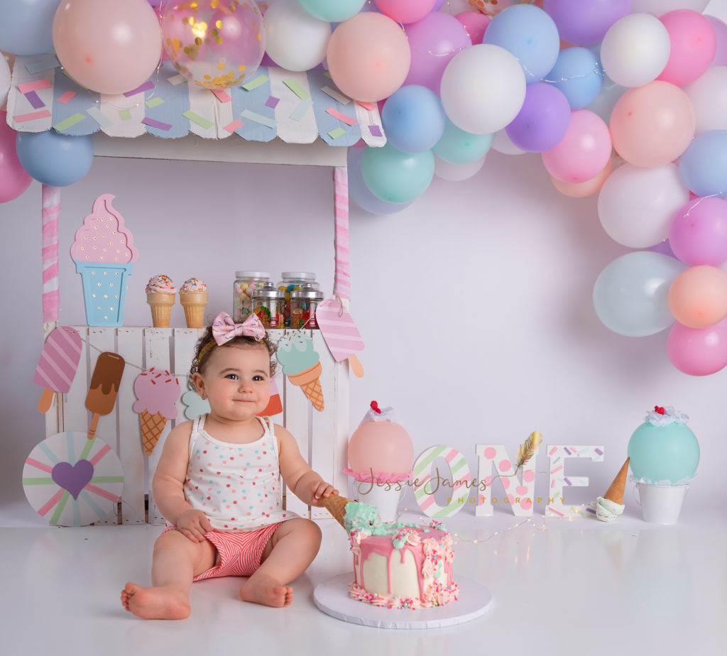 baby touching birthday cake, ice cream themed cake smash, summer photoshoot