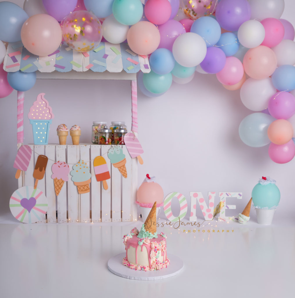 ice cream themed backdrop, ice cream cake smash, balloon arch, ice cream backdrop