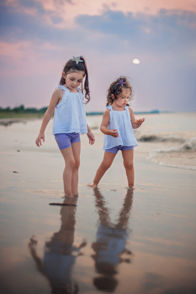 Children's milestone photos at sunset on the beach