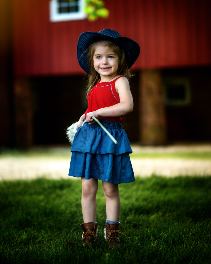 (Girl in red top and blue skirt in front of barn)
Keyphrase: Rustic Barn Kids Fall Portrait Holmdel NJ